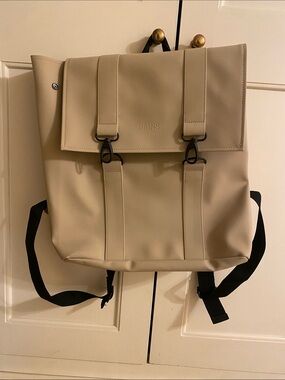 Rains Sand Roll-Top Backpack in Beige with Black Straps